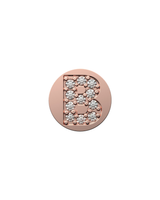 Rose gold charm with letter 'B' made of crystals on a white background